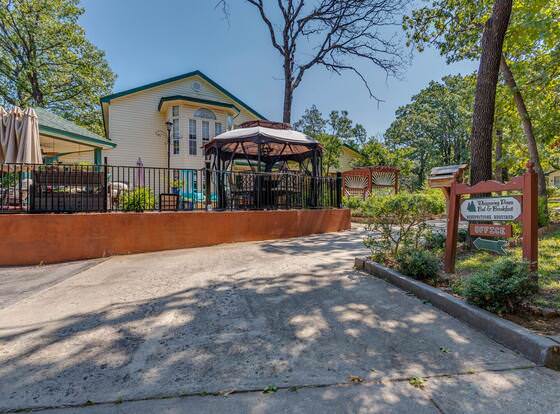 The Whispering Pines Inn Bed & Breakfast allows check-in for 18 year-old guests