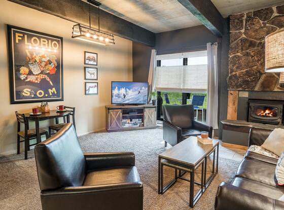 Ski-in ski-out Slope Side - Shuttle, Fireplace, Clubhouse & Wifi allows check-in for 18 year-old guests