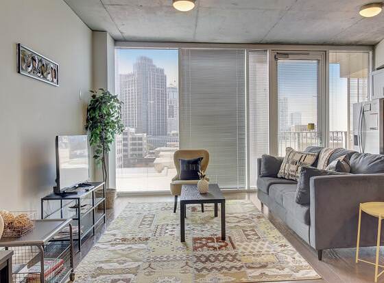 FRONTDESK Uptown Apts with City Views Charlotte allows check-in for 18 year-old guests