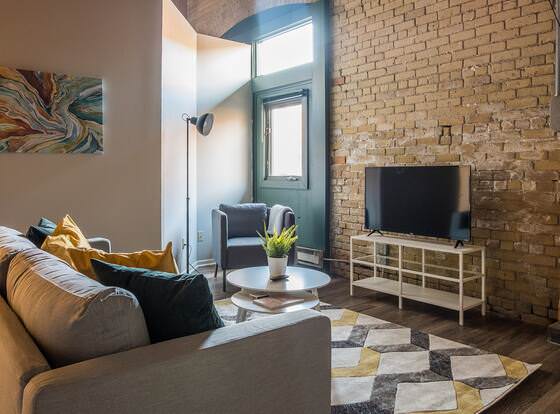 FRONTDESK 50 4th Ave Apts North Loop Warehouse District allows check-in for 18 year-old guests