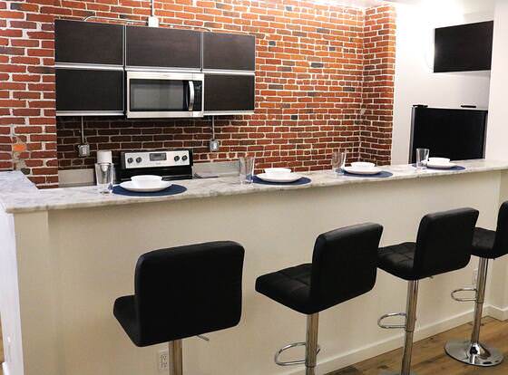 Aparthotel Suites at The Haas allows check-in for 18 year-old guests