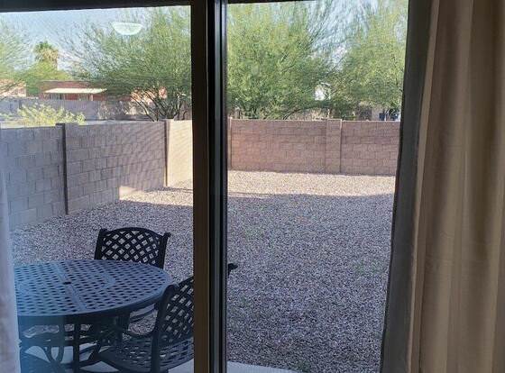 Spacious, Homey 4-bedroom in Tucson allows check-in for 18 year-old guests