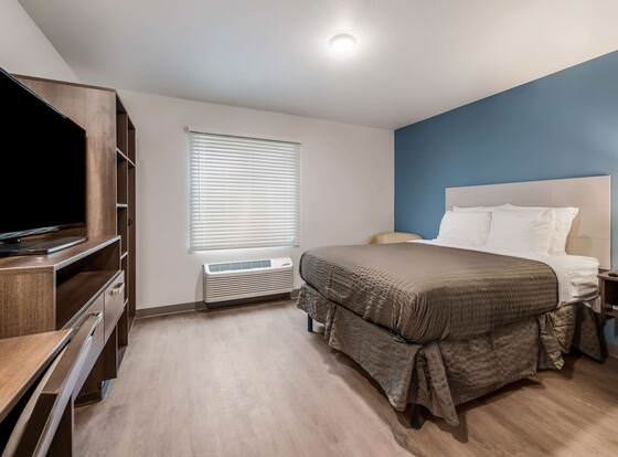 WoodSpring Suites Charlotte - University Research Park allows check-in for 18 year-old guests