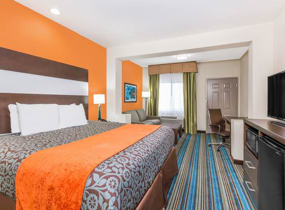 Days Inn & Suites by Wyndham Katy allows check-in for 18 year-old guests